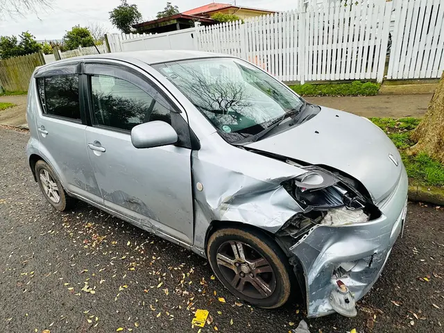 Daihatsu Sirion with front-corner accident damage