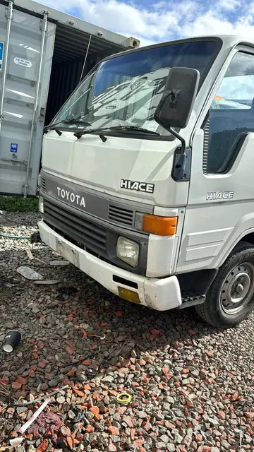 White Toyota HiAce light truck bought for cash
